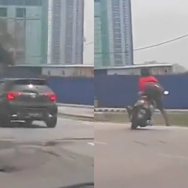 Motosikal langgar jalan raya berlubang
